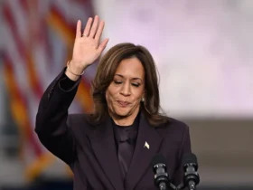 TOPSHOT - US Vice President Democratic presidential candidate Kamala Harris waves at supporters at the end of her concession speech at Howard University in Washington, DC, on November 6, 2024. Donald Trump won a sweeping victory on November 6, 2024 in the US presidential election, defeating Kamala Harris to complete an astonishing political comeback that sent shock waves around the world. (Photo by SAUL LOEB / AFP) (Photo by SAUL LOEB/AFP via Getty Images)