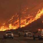 Over 50,000 under evacuation orders or warnings as wildfire imperils homes north of Los Angeles