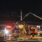 Passenger plane catches fire at South Korean airport. All 176 people on board are evacuated