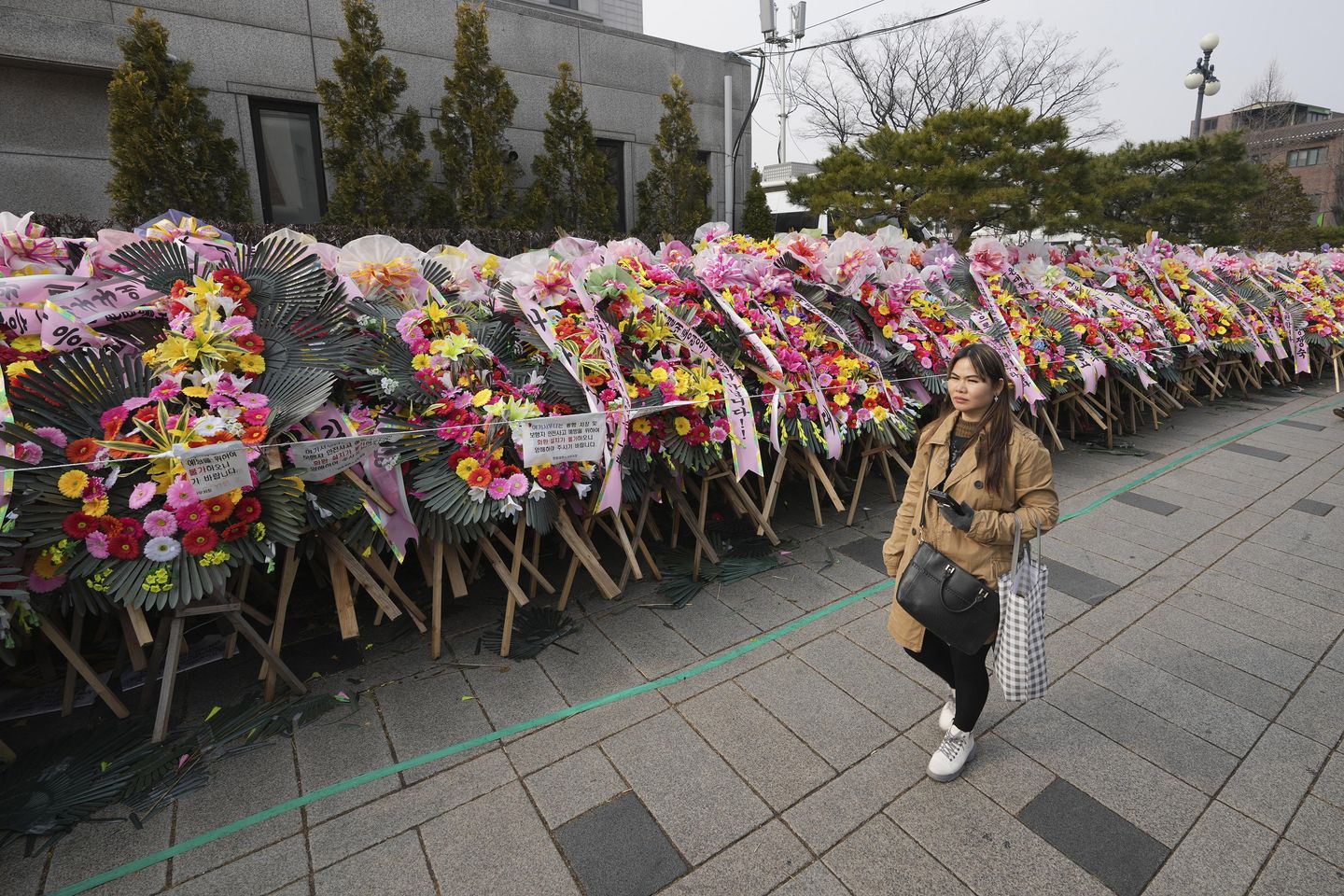 South Koreans turn funeral wreaths and K-pop light sticks into political protest tools