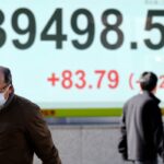 Stock market today: Asia shares mostly rise while some regional markets stay closed for holidays