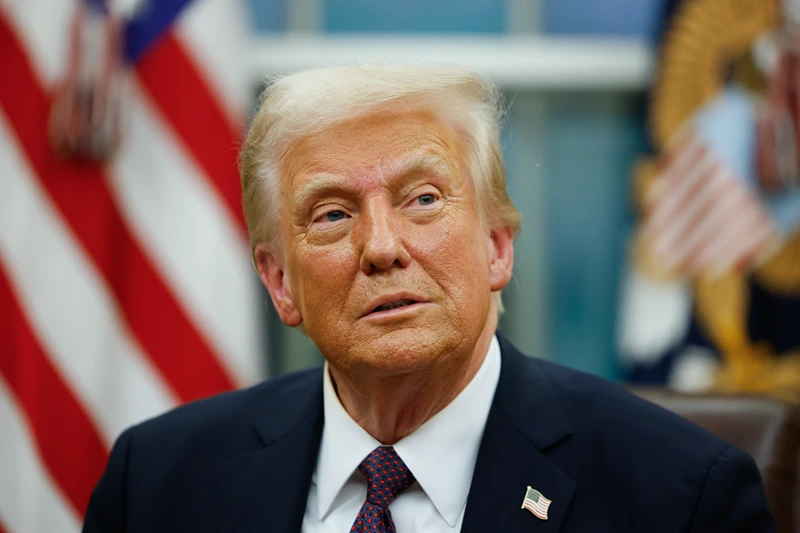 WASHINGTON, DC - JANUARY 20: President Donald Trump signs executive orders in the Oval Office on January 20, 2025 in Washington, DC. Trump takes office for his second term as the 47th president of the United States. (Photo by Anna Moneymaker/Getty Images)
