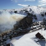 Witnesses at a Turkish ski resort stood helpless as people leaped out of a burning hotel