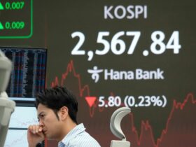 Asian shares advance, despite Wall Street's tumble, as China pledges to boost consumer spending