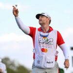 Caddie JJ Jakovac reacts to hole-in-one at TPC Sawgrass