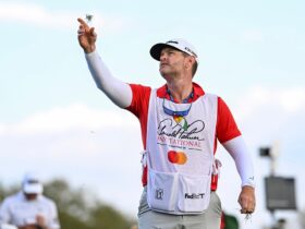 Caddie JJ Jakovac reacts to hole-in-one at TPC Sawgrass