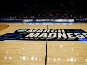 March Madness: Fan throws water bottle on court at Louisville-Creighton game