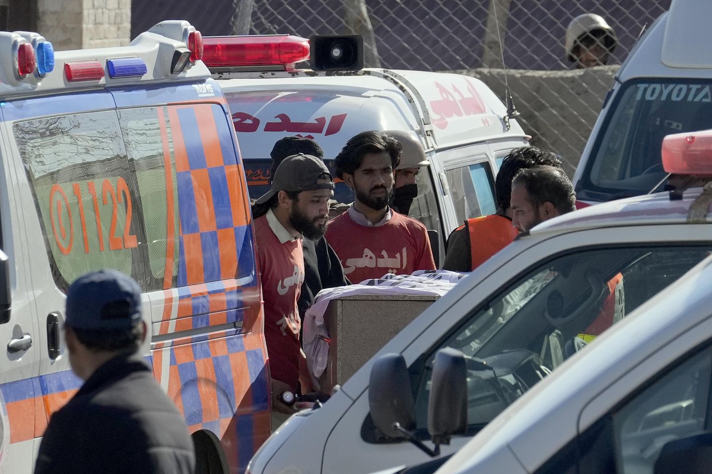 Pakistan's leader meets survivors of deadly train hijack and the commandos who ended the siege