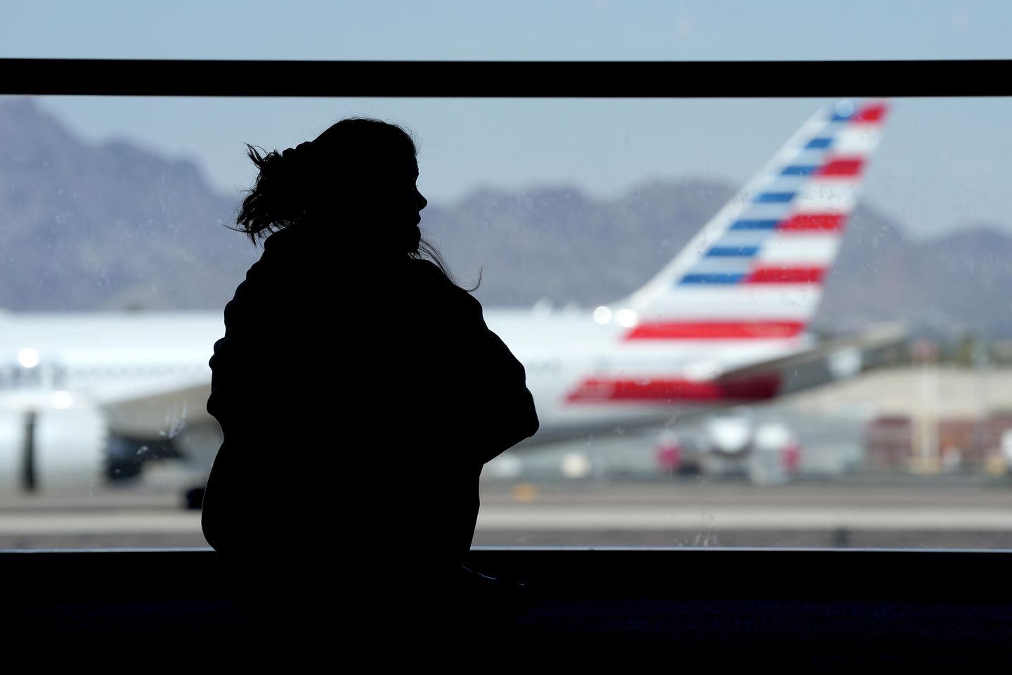 Passengers evacuated after American Airlines plane catches fire at Denver airport