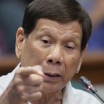 Rodrigo Duterte is in ICC custody in The Hague : NPR