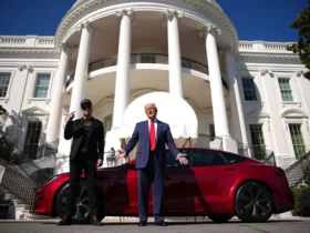 President Donald Trump and White House Senior Advisor, Tesla and SpaceX CEO Elon Musk deliver remarks next to a Tesla Model S on the South Lawn of the White House on March 11, 2025 in Washington, DC. Trump spoke out against calls for a boycott of Elon Musk’s companies and said he would purchase a Tesla vehicle in what he calls a ‘show of confidence and support’ for Elon Musk. (Photo by Andrew Harnik/Getty Images)