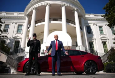 President Donald Trump and White House Senior Advisor, Tesla and SpaceX CEO Elon Musk deliver remarks next to a Tesla Model S on the South Lawn of the White House on March 11, 2025 in Washington, DC. Trump spoke out against calls for a boycott of Elon Musk’s companies and said he would purchase a Tesla vehicle in what he calls a ‘show of confidence and support’ for Elon Musk. (Photo by Andrew Harnik/Getty Images)