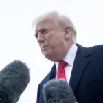 Trump has unfortunate brush with boom mic, sees funny side