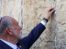 Huckabee arrives in Israel as new U.S. ambassador, visits Western Wall : NPR
