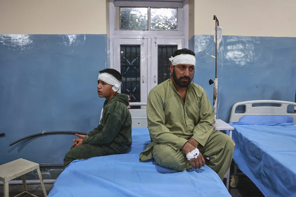A father and a son who live in a village near the Line of Control between India and Pakistan and got injured in Pakistani shelling get treated in a hospital in Uri, Indian controlled Kashmir, Wednesday, May 7, 2025.