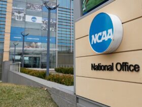 Judge approves $2.8B settlement, paving way for US colleges to pay athletes millions